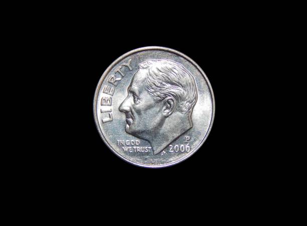 american one dime coin (10 cents) isolated on black background